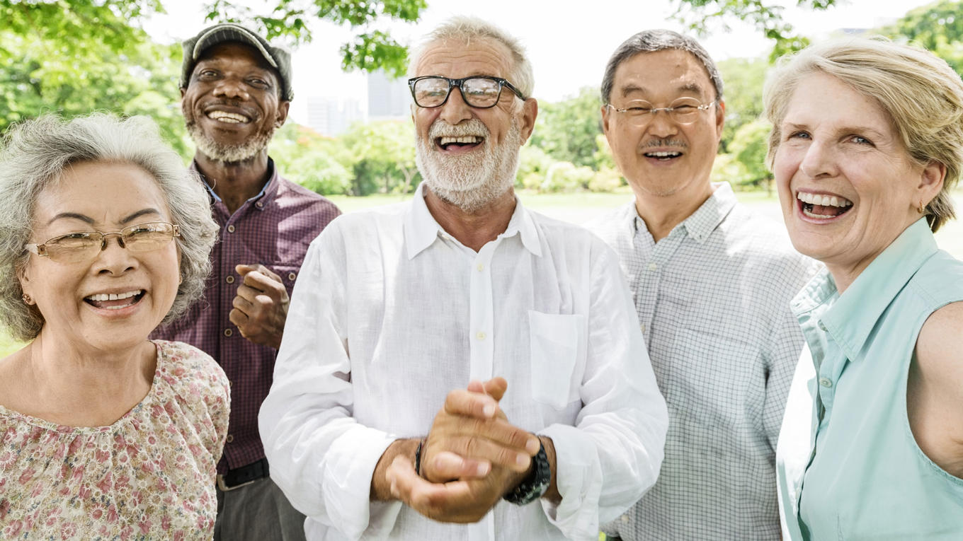 Elderly group of people laughing together