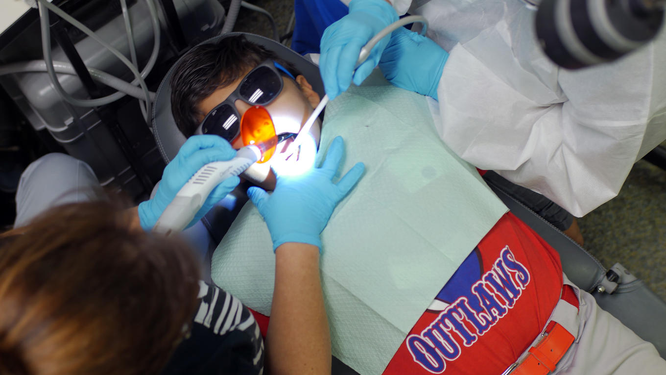 Image of boy receiving dental care